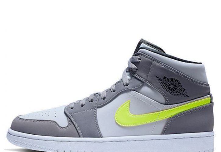 The Rise of the Air Jordan 1 Mid Grey Volt as a Must-Have Sneaker in 2023
